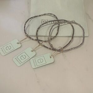 Set of 3 eNewton Hope Unwritten Bracelets in chocolate and taupe